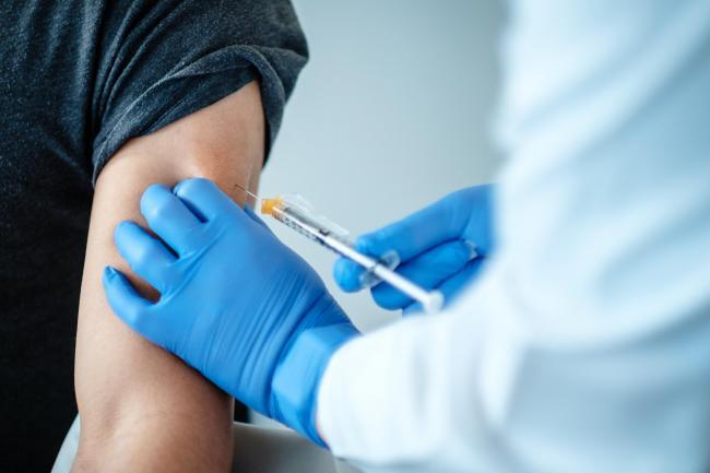 A patient being given a dose of a coronavirus vaccine (Picture: PA)