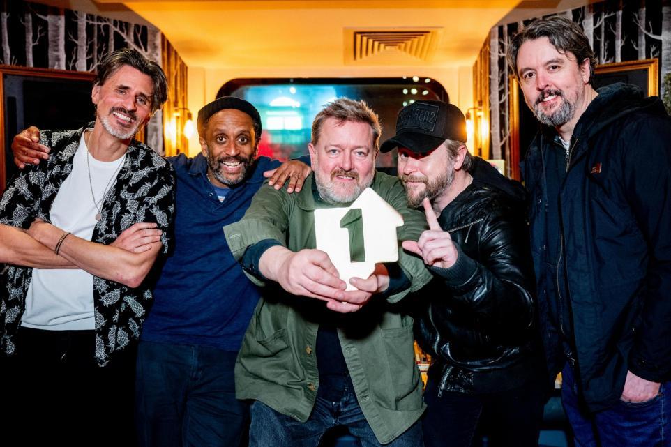 Elbow receive their Official Number 1 Album Award for Audio Vertigo in March (Official Charts/PA)